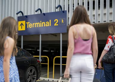 family walking to terminal 2
